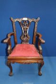 A very elegant and charming Mahogany Chippendale style miniature open armed Elbow Chair having