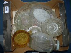 A quantity of pressed glass including lemon squeezer, bath salts bottle, footed bowls, etc.