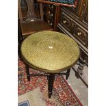 A circular brass topped occasional Table,