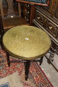 A circular brass topped occasional Table,