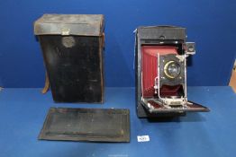 An Eastman Kodak No. 4 Speed Model and a large Format bellows camera, with spare back, cased.