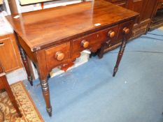 A circa 1900 cross-banded Mahogany side Table having three frieze drawers with turned wooden knobs