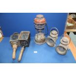 A brass and enamel Tilley lamp, two carriage lamps and two brass 'Camelimax' railway lamps a/f.