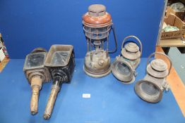 A brass and enamel Tilley lamp, two carriage lamps and two brass 'Camelimax' railway lamps a/f.