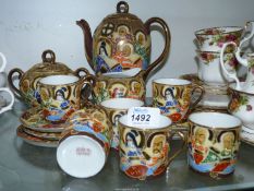 A Japanese part Teaset (hairline to one cup).