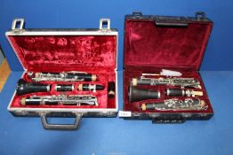A Boosey & Hawkes flute, and a "Blessing" flute, both cased.