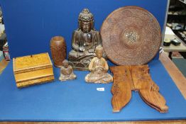 A quantity of Treen including; small table with folding legs, Buddha figures (some a/f),