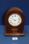 A Mantle clock with shell marquetry design, with key, 8 1/2" tall x 6 1/2" wide.