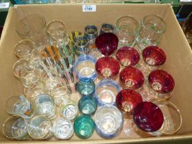 A box of drinking glasses, shots, etc.