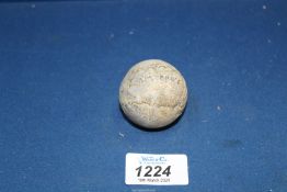 An old style Golf ball.