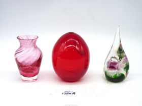 A heavy red ovoid glass stem vase, 5 1/2" tall,