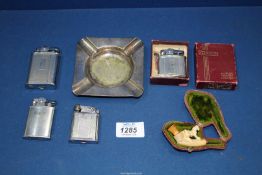 A small qty of smoking ephemera incl. boxed Ronson's lighter, ashtrays, cased Meerschaum pipe etc.