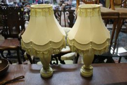 A pair of Alabaster table lamps with shades, 15" tall excluding bulb and shades.
