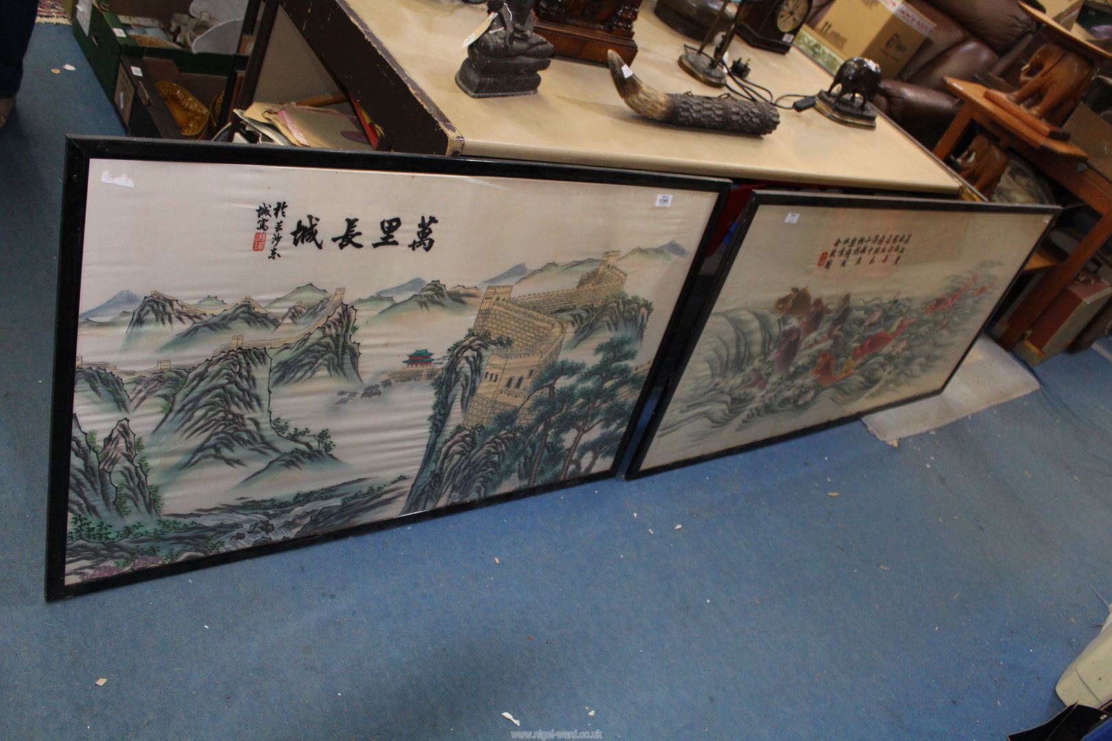 Two large framed Oriental embroideries, one of Koi, other of Great Wall of China, largest 5' x 28".