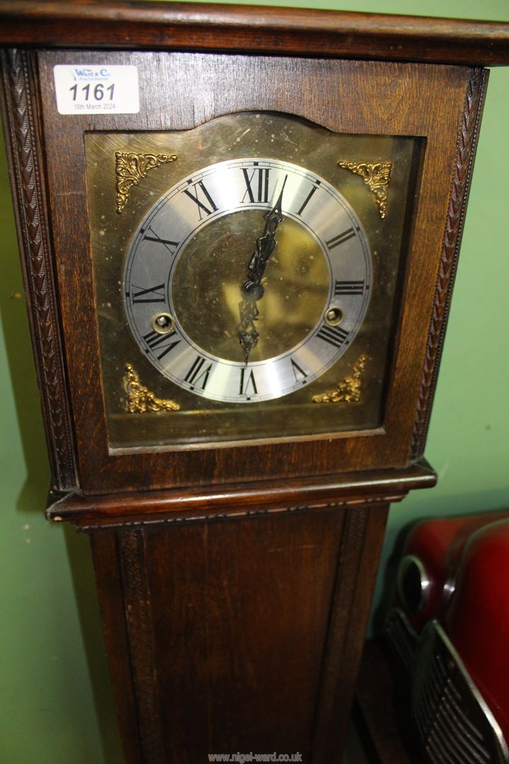 An Oak cased Grandmother Clock having a brass and silver face with Roman numerals, - Image 2 of 2