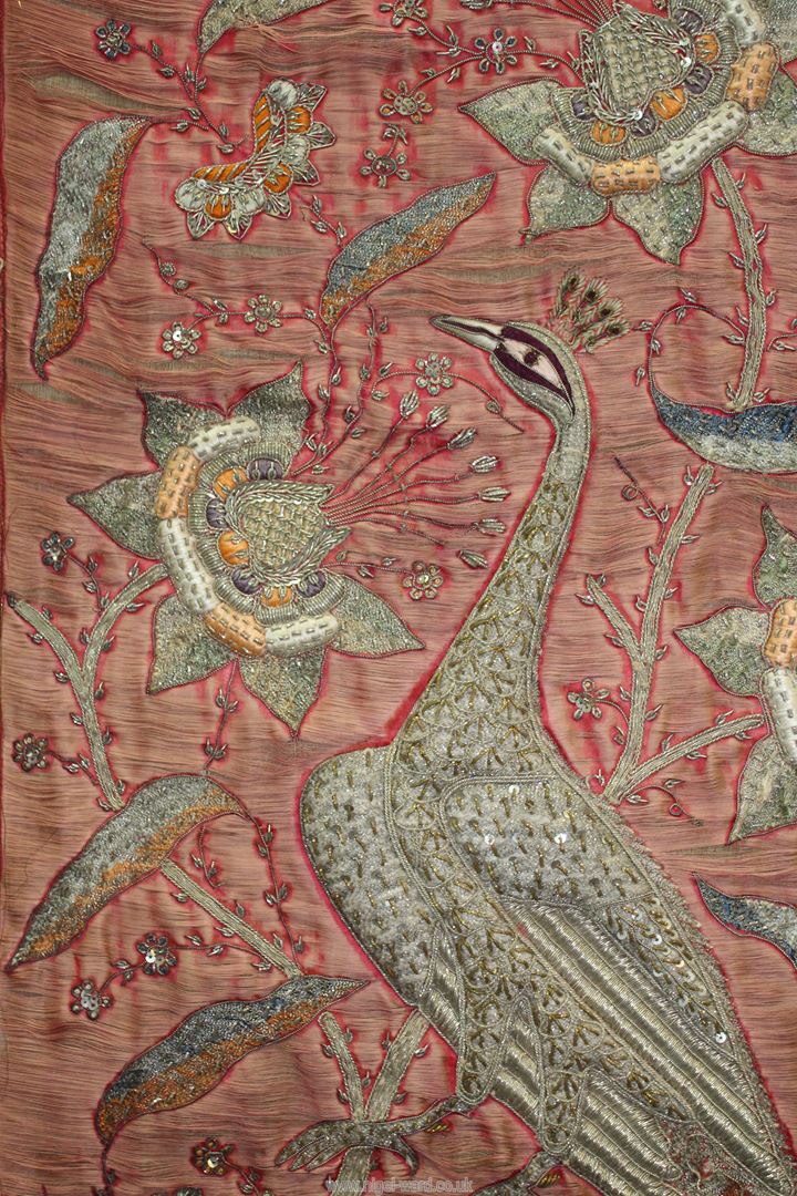 An antique Indian silk tapestry of a Peacock with metallic thread, a/f, 32'' x 36 1/2''. - Image 2 of 3