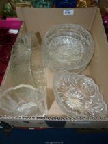 A quantity of clear and cut glass including trifle and fruit bowls, vase, etc.