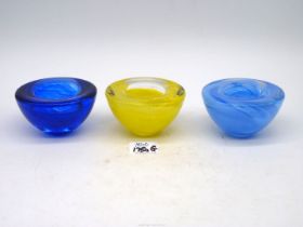 A trio of Kosta Boda swirled glass candle holder Votives by Anna Ehrner, in cobalt blue,