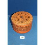 A circa 1900 Burmese Bagan red lacquered round Betel Nut box, 7 1/2'' diameter x 4'' high. a/f.