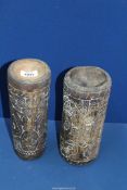 A near pair of New Guinea carved bamboo lime containers, finely incised with stylised crocodiles,