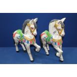 A pair of brightly painted wooden fairground style horses, 16 1/2" high.