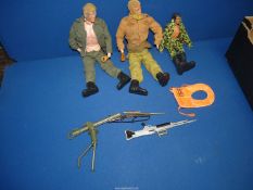 Two Action Men and a quantity of accessories including; clothes, oxygen tanks, guns, grenades, etc.