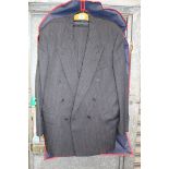 A Dunn & Co. double breasted suit in dark grey with blue stripe jacket size 44R, trousers 38R.