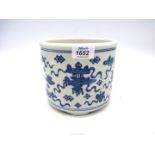 A Chinese blue and white porcelain cache pot decorated with Chinese objects and symbols,