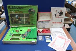 A vintage Golf training AFBS and Subbuteo Football set (incomplete) and 1920's Golf adverts and