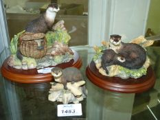 Three Border Fine Arts (including one Studio) Otter ornaments; 'The Poacher' (a/f.