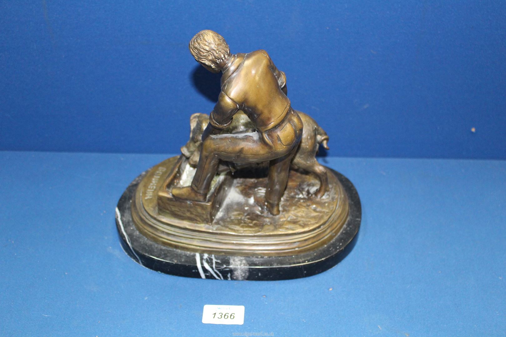 A heavy Bronze on marble plinth of a Farmer feeding a pig, - Image 3 of 3