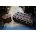 A Metal hat box in simulated oak paint finish, 19th century, original condition and a Tin trunk,