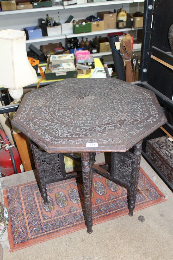 A large Anglo Indian wood Benares table with octagonal top.