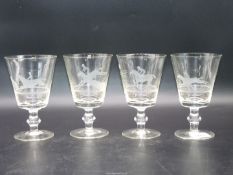 Four crystal Claret glasses with etched decoration depicting horse racing scenes, including Finish,