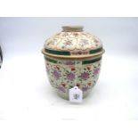 A large Benjarong covered vessel, 18th-19th century painted with flowers, 8 3/4'' tall,