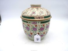 A large Benjarong covered vessel, 18th-19th century painted with flowers, 8 3/4'' tall,