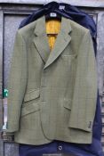 A Gents pure lambs wool Bladen Supasax Sports jacket in moss green with blue, yellow, black check,