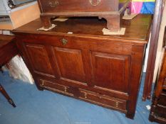 A circa 1800 three panel peg-joyned Oak Coffer,