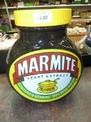 A Wade Marmite jar with transfer print label, 10 1/2" tall.