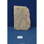 A fragmentary ancient Egyptian stone relief carving,