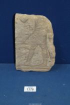 A fragmentary ancient Egyptian stone relief carving,