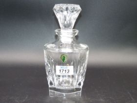 A small Waterford crystal decanter with stopper, 8" tall.