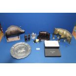 A quantity of pigs including stylised metal boar, two pig trinket pots,