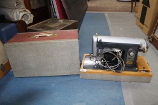 An "Universal" electric sewing machine in case (pedal a/f).