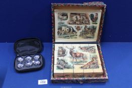 A six sided block jigsaw of animals, six images on paper, in original box, very rare,