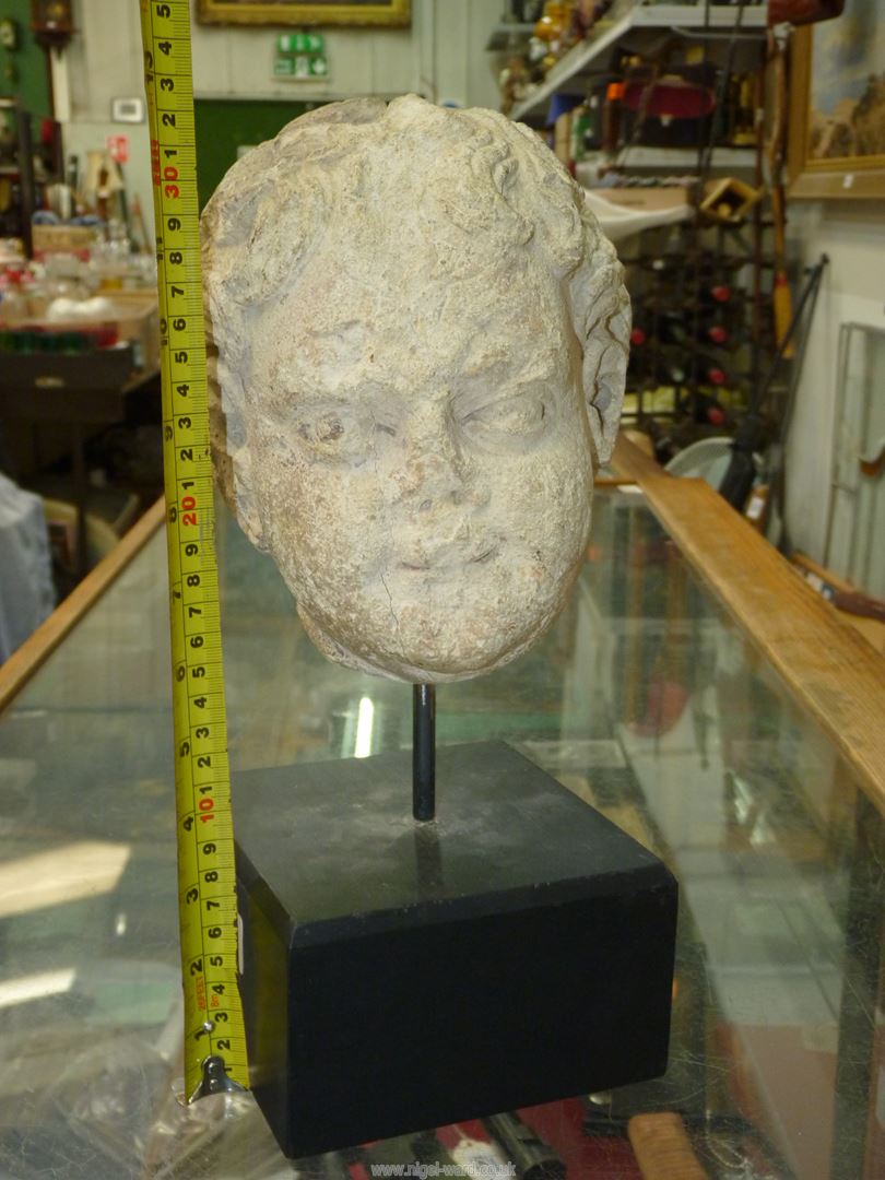 A very early life size marble head from a free standing figure of a young child. - Image 5 of 15