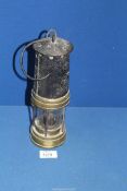 A brass & metal Miners Lamp, 10 1/2" tall.
