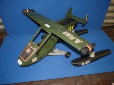 An Action Man pursuit craft with seaplane attachments.