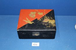 A 19th century lacquered Box with gold leaves and bird decoration, 8" x 7" x 3".