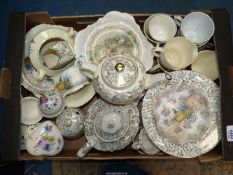 A quantity of crinoline lady decorated part tea and dinnerware, some a/f.